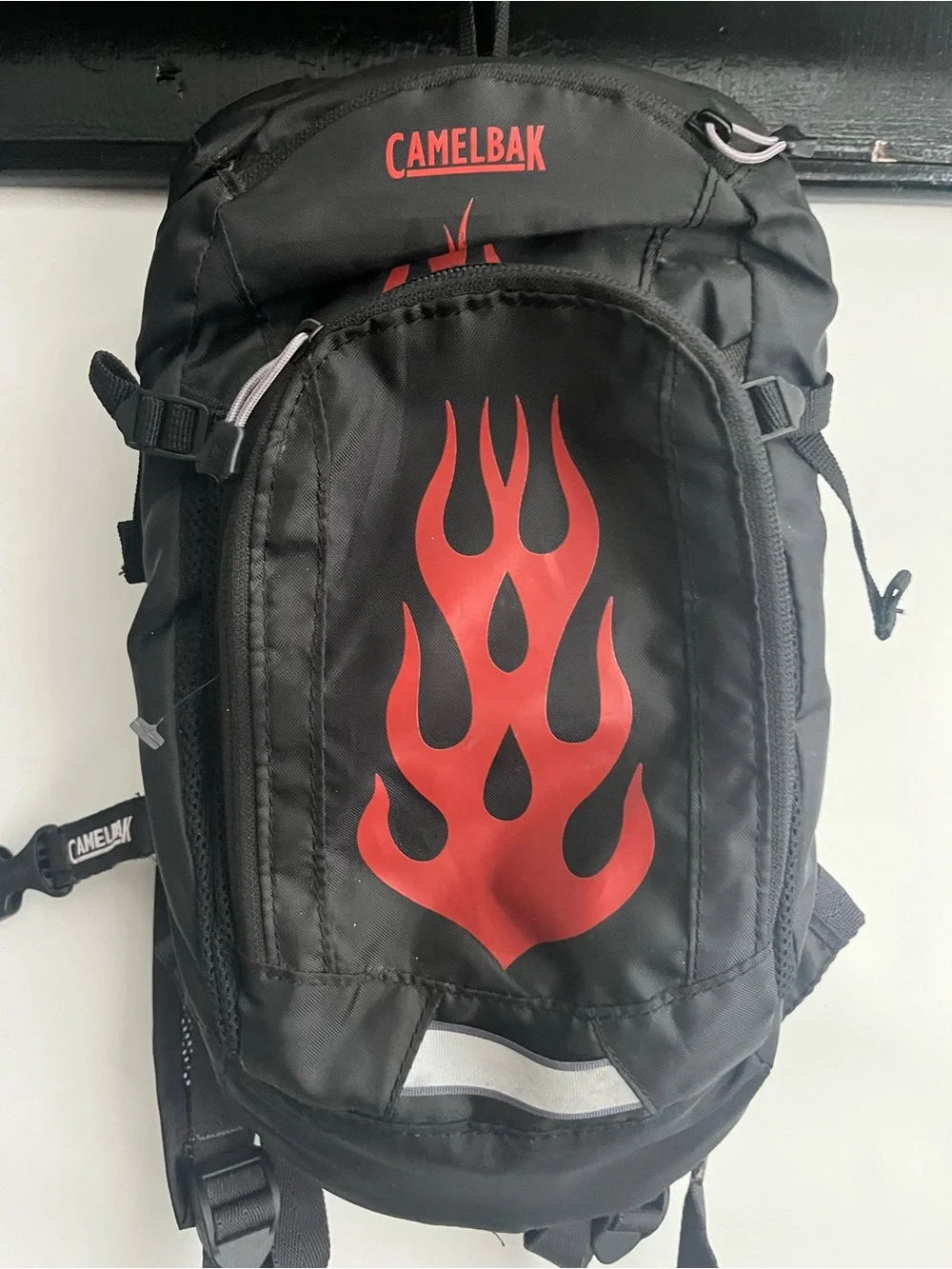 CamelBak Black Backpack with Red Flame Graphic Accent